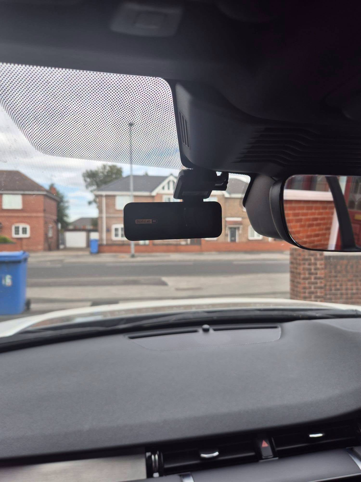 Front dash camera fitted below the rear view mirror