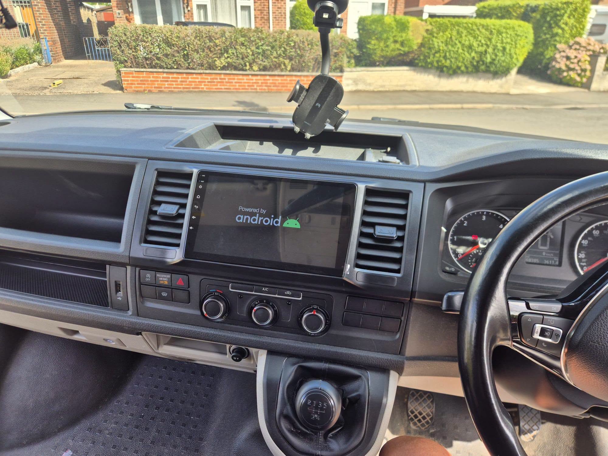 Aftermarket Android screen fitted in a van dashboard